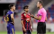 27 August 2020; Referee Timotheos Christofi talks to Keith Buckley of Bohemians, left, and Lyes Houri of Fehervar during the UEFA Europa League First Qualifying Round match between Fehervar and Bohemians at MOL Aréna Sóstó in Székesfehérvár, Hungary. Photo by Vid Ponikvar/Sportsfile