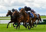 28 August 2020; Divinely, right, with Wayne Lordan up, races alongside eventual second and third places respectively Ahandfulofsummers, centre, with Chris Hayes up, and Ubuntu, left, with Declan McDonagh up, on their way to winning the Kilcarn Stud Flame Of Tara Irish EBF Stakes at The Curragh Racecourse in Kildare. Photo by Seb Daly/Sportsfile
