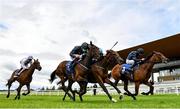 28 August 2020; Divinely, 3, with Wayne Lordan up, races alongside eventual second and third places respectively Ahandfulofsummers, centre, with Chris Hayes up, and Ubuntu, left, with Declan McDonagh up, on their way to winning the Kilcarn Stud Flame Of Tara Irish EBF Stakes at The Curragh Racecourse in Kildare. Photo by Seb Daly/Sportsfile