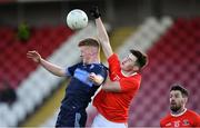 28 August 2020; Ciarán Daly of Trillick, supported by team-mate Mattie Donnelly, punches the ball clear from Nathan Donnelly of Killyclogher during the Tyrone County Senior Football Championship Quarter-Final match between Trillick St Macartan's and Killyclogher St Mary's at Healy Park in Omagh, Tyrone. Photo by Piaras Ó Mídheach/Sportsfile