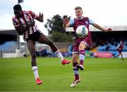 29 August 2020; Derek Prendergast of Drogheda United in action against Ibrahim Meite of Derry City during the Extra.ie FAI Cup Second Round match between Drogheda United and Derry City at United Park in Drogheda, Louth. Photo by Stephen McCarthy/Sportsfile