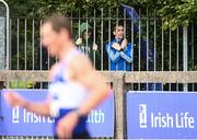 29 August 2020; Olympian and race walking coach Robert Heffernan, right, watches on from outside the stadium as Brendan Boyce of Finn Valley AC, Donegal, competes in the Men's 10,000m Walk event during day three of the Irish Life Health National Senior and U23 Athletics Championships at Morton Stadium in Santry, Dublin. Photo by Sam Barnes/Sportsfile