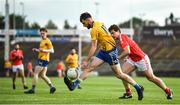 29 August 2020; Peter Naughton of Knockmore in action against Joe Geraghty of Ballintubber during the Mayo County Senior Football Championship Quarter-Final match between Ballintubber and Knockmore at Elverys MacHale Park in Castlebar, Mayo. Photo by David Fitzgerald/Sportsfile