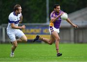 29 August 2020; Craig Dias of Kilmacud Crokes gets past Nathan Mullins of St Vincent's during the Dublin County Senior Football Championship Quarter-Final match between Kilmacud Crokes and St Vincent's at Parnell Park in Dublin. Photo by Piaras Ó Mídheach/Sportsfile