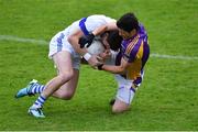 29 August 2020; Diarmuid Connolly of St Vincent's is tackled by Rory O'Carroll of Kilmacud Crokes during the Dublin County Senior Football Championship Quarter-Final match between Kilmacud Crokes and St Vincent's at Parnell Park in Dublin. Photo by Piaras Ó Mídheach/Sportsfile