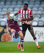 29 August 2020; Derek Prendergast of Drogheda United in action against Ibrahim Meite of Derry City during the Extra.ie FAI Cup Second Round match between Drogheda United and Derry City at United Park in Drogheda, Louth. Photo by Stephen McCarthy/Sportsfile