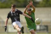 30 August 2020; Allan Kieran of Magheracloone in action against Niall Loughman of Carrickmacross during the Monaghan County Senior Football Championship Quarter-Final match between Carrickmacross Emmets and Magheracloone at Inniskeen Grattans GAA Club in Inniskeen, Monaghan. Photo by Philip Fitzpatrick/Sportsfile