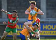 30 August 2020; Eoin McHugh of Na Fianna gathers possession ahead of team-mate Dean Ryan and James Burke of Ballymun Kickhams during the Dublin County Senior Football Championship Quarter-Final match between Ballymun Kickhams and Na Fianna at Parnell Park in Dublin. Photo by Piaras Ó Mídheach/Sportsfile