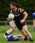 30 August 2020; Brian Meade of Nobber clears from Niall Finnerty of Skryne during the Meath County Senior Football Championship match between Skryne and Nobber at Fr Tully Park in Seneschalstown, Meath. Photo by Ray McManus/Sportsfile