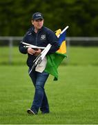 30 August 2020; Tony McDonnell collects sideline flags after the Meath County Senior Football Championship match between Skryne and Nobber at Fr Tully Park in Seneschalstown, Meath. Photo by Ray McManus/Sportsfile
