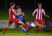 30 August 2020; Colm Whelan of UCD in action against Lewis Banks, left, and Niall Morahan of Sligo Rovers  during the Extra.ie FAI Cup Second Round match between UCD and Sligo Rovers at UCD Bowl in Belfield, Dublin. Photo by Stephen McCarthy/Sportsfile