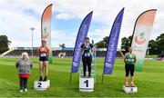 30 August 2020; Athletics Ireland President Georgina Drumm, left, alongside Women's Weight for Distance medallists, from left, Casey Mulvey of Inny Vale AC, Cavan, silver, Ebony Hogan of Birr AC, Offaly, gold, and Zoe Mohan of Cushinstown AC, Meath, during day four of the Irish Life Health National Senior and U23 Athletics Championships at Morton Stadium in Santry, Dublin. Photo by Sam Barnes/Sportsfile