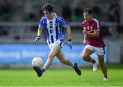 30 August 2020; Ciarán O'Reilly of Ballyboden St Enda's gets away from Rutherson Real of Raheny during the Dublin County Senior Football Championship Quarter-Final match between Ballyboden St Enda's and Raheny at Parnell Park in Dublin. Photo by Piaras Ó Mídheach/Sportsfile
