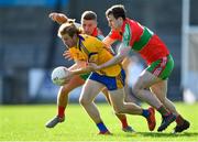 30 August 2020; Aaron Byrne of Na Fianna in action against Leon Young, left, and Aaron Elliott of Ballymun Kickhams during the Dublin County Senior Football Championship Quarter-Final match between Ballymun Kickhams and Na Fianna at Parnell Park in Dublin. Photo by Piaras Ó Mídheach/Sportsfile