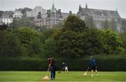 1 September 2020; Groundstaff rake the pitch ahead of the 2020 Test Triangle Inter-Provincial Series match between Munster Reds and Leinster Lightning at The Mardyke Cricket Grounds in Cork. Photo by Sam Barnes/Sportsfile