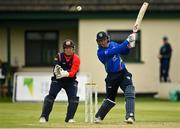 1 September 2020; David Rankin of North West Warriors plays a shot, watched by Northern Knights wicket-keeper Gary Wilson, during the 2020 Test Triangle Inter-Provincial Series match between Northern Knights and North West Warriors at North Down Cricket Club in Comber, Down. Photo by Seb Daly/Sportsfile