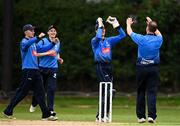 1 September 2020; Lorcan Tucker of Leinster Lightning, second from right, celebrates with James Newland, right, and team-mates after catching out Jeremy Lawlor of Munster Reds during the 2020 Test Triangle Inter-Provincial Series match between Munster Reds and Leinster Lightning at The Mardyke Cricket Grounds in Cork. Photo by Sam Barnes/Sportsfile