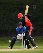 1 September 2020; Tim Tector of Munster Reds plays a shot watched by Lorcan Tucker of Leinster Lightning during the 2020 Test Triangle Inter-Provincial Series match between Munster Reds and Leinster Lightning at The Mardyke Cricket Grounds in Cork. Photo by Sam Barnes/Sportsfile