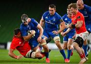 4 September 2020; Caelan Doris of Leinster is tackled by CJ Stander of Munster during the Guinness PRO14 Semi-Final match between Leinster and Munster at the Aviva Stadium in Dublin. Photo by Ramsey Cardy/Sportsfile