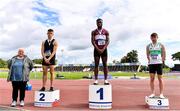 5 September 2020; Athletics Ireland President Georgina Drumm, left, alongside Junior Men's 100m medallists, from left, Oliver Swinney of Speed Development Project Track Club, silver, Charles Okafor of Mullingar Harriers AC, Westmeath, gold, and Michael Farrelly of Raheny Shamrock AC, Dublin, bronze, during the Irish Life Health National Junior Track and Field Championships at Morton Stadium in Santry, Dublin. Photo by Sam Barnes/Sportsfile