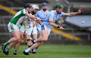 5 September 2020; William O'Donoghue of Na Piarsaigh in action against Kenny Power and Stevie O'Reilly of Ballybrown during the Limerick County Senior Hurling Championship Quarter-Final match between Ballybrown and Na Piarsaigh at the LIT Gaelic Grounds in Limerick. Photo by Matt Browne/Sportsfile