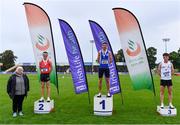 5 September 2020; Athletics Ireland President Georgina Drumm, left, with Junior Men's 1500m medallists, from left, Tadgh Donnelly of Drogheda and District AC, Louth, silver, Sean Donoghue of Celtic DCH AC, Dublin, gold, and Michael Morgan of Sligo AC, bronze, during the Irish Life Health National Junior Track and Field Championships at Morton Stadium in Santry, Dublin. Photo by Sam Barnes/Sportsfile