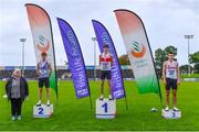 5 September 2020; Athletics Ireland President Georgina Drumm, left, alongside Junior Men's 400m medallists, from left, Cian Dunne of Dundrum South Dublin AC, silver, Robert McDonnell of Galway City Harriers AC, gold, and Hugo Magee of Crusaders AC, Dublin, bronze, during the Irish Life Health National Junior Track and Field Championships at Morton Stadium in Santry, Dublin. Photo by Sam Barnes/Sportsfile