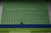 6 September 2020; A security guard stands watch in front of a block of empty seating prior to the UEFA Nations League B match between Republic of Ireland and Finland at the Aviva Stadium in Dublin. Photo by Seb Daly/Sportsfile
