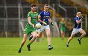 6 September 2020; Peter O'Hanlon of Carrickmacross  in action against Frank Caulfield of Scotstown during the Monaghan County Senior Football Championship Semi-Final between Scotstown and Carrickmacross Emmets at St Tiernach's Park in Clones, Monaghan. Photo by Philip Fitzpatrick/Sportsfile