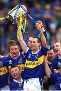 9 September 2001; Tipperary's Thomas Dunne lifts the Liam MacCarthy Cup after victory over Galway. All-Ireland Senior Hurling Final, Tipperary v Galway, Croke Park, Dublin. Photo by Ray McManus/Sportsfile