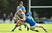 12 September 2020; Jack Ringrose of UCD is tackled by Adam McEvoy of St Marys College during the Leinster Senior Cup Round Two match between St Marys College and UCD at Templeville Road in Dublin. Photo by Ramsey Cardy/Sportsfile
