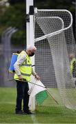 12 September 2020; Martin Keane sanitises the white flag beside the goal posts before the Clare County Senior Hurling Championship Semi-Final match between Sixmilebridge and Eire Óg at Cusack Park in Ennis, Clare. Photo by Ray McManus/Sportsfile