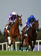 12 September 2020; Magical, left, with Seamie Heffernan up, races alongside eventual second place and favourite Ghaiyyath, right, with William Buick up, on their way to winning the Irish Champion Stakes during day one of The Longines Irish Champions Weekend at Leopardstown Racecourse in Dublin. Photo by Seb Daly/Sportsfile