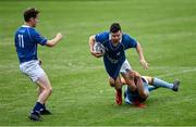 12 September 2020; David Fanagan of St Marys College is tackled by David Moran of UCD during the Leinster Senior Cup Round Two match between St Marys College and UCD at Templeville Road in Dublin. Photo by Ramsey Cardy/Sportsfile