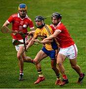 12 September 2020; Jason Loughnane of Sixmilebridge in action against Tommy Downes and Darren O'Brien of Eire Óg, left,  during the Clare County Senior Hurling Championship Semi-Final match between Sixmilebridge and Eire Óg at Cusack Park in Ennis, Clare. Photo by Ray McManus/Sportsfile