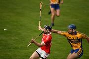 12 September 2020; Danny Russell of Eire Óg in action against Noel Purcell of Sixmilebridge during the Clare County Senior Hurling Championship Semi-Final match between Sixmilebridge and Eire Óg at Cusack Park in Ennis, Clare. Photo by Ray McManus/Sportsfile