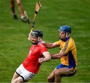 12 September 2020; Danny Russell of Eire Óg in action against Noel Purcell of Sixmilebridge during the Clare County Senior Hurling Championship Semi-Final match between Sixmilebridge and Eire Óg at Cusack Park in Ennis, Clare. Photo by Ray McManus/Sportsfile