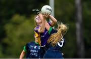 12 September 2020; Lauren Magee of Kilmacud Crokes is tackled by Andrea Murphy of Foxrock Cabinteely during the Dublin County Senior Ladies Football Championship Final match between Foxrock Cabinteely and Kilmacud Crokes at Lawless Memorial Park in Fingallians GAA, Swords, Dublin. Photo by Piaras Ó Mídheach/Sportsfile