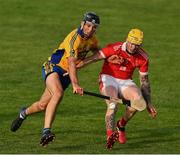 12 September 2020; Aaron Fitzgerald of Eire Óg in action against Cathal Malone of Sixmilebridge during the Clare County Senior Hurling Championship Semi-Final match between Sixmilebridge and Eire Óg at Cusack Park in Ennis, Clare. Photo by Ray McManus/Sportsfile