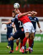 12 September 2020; Georgie Kelly of St Patrick's Athletic in action against David Cawley of Sligo Rovers during the SSE Airtricity League Premier Division match between St. Patrick's Athletic and Sligo Rovers at Richmond Park in Dublin. Photo by Ben McShane/Sportsfile