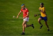12 September 2020; Darren O'Brien of Eire Óg in action against Alan Mulready of Sixmilebridge during the Clare County Senior Hurling Championship Semi-Final match between Sixmilebridge and Eire Óg at Cusack Park in Ennis, Clare. Photo by Ray McManus/Sportsfile