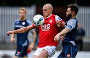 12 September 2020; Georgie Kelly of St Patrick's Athletic in action against David Cawley of Sligo Rovers during the SSE Airtricity League Premier Division match between St. Patrick's Athletic and Sligo Rovers at Richmond Park in Dublin. Photo by Ben McShane/Sportsfile