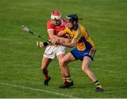 12 September 2020; Alan Mulready of Sixmilebridge in action against Tagdh Connellan of Eire Óg during the Clare County Senior Hurling Championship Semi-Final match between Sixmilebridge and Eire Óg at Cusack Park in Ennis, Clare. Photo by Ray McManus/Sportsfile