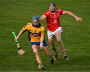 12 September 2020; Barry Corry of Sixmilebridge in action against Davy Mac of Eire Óg during the Clare County Senior Hurling Championship Semi-Final match between Sixmilebridge and Eire Óg at Cusack Park in Ennis, Clare. Photo by Ray McManus/Sportsfile