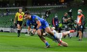 12 September 2020; James Lowe of Leinster scores his side's first try despite the tackle of Michael Lowry of Ulster during the Guinness PRO14 Final match between Leinster and Ulster at the Aviva Stadium in Dublin. Photo by Brendan Moran/Sportsfile