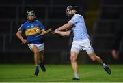 12 September 2020; Cathall King of Na Piarsaigh in action against Patrick Kirby of Patrickswell during the Limerick County Senior Hurling Championship Semi-Final match between Patrickswell and Na Piarsaigh at LIT Gaelic Grounds in Limerick. Photo by Diarmuid Greene/Sportsfile