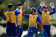 13 September 2020; Abubakar Saddique of Cork County, left, celebrates with team-mates, including Nabeel Anjum, after catching Simi Singh of YMCA during the All-Ireland T20 Semi-Final match between YMCA and Cork County at Pembroke Cricket Club in Dublin. Photo by Sam Barnes/Sportsfile