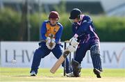 13 September 2020; Wilhelm de Klerk of YMCA playes a shot as Benjamin Marris of Cork County  watches on during the All-Ireland T20 Semi-Final match between YMCA and Cork County at Pembroke Cricket Club in Dublin. Photo by Sam Barnes/Sportsfile