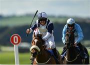 13 September 2020; Jockey Tom Evans celebrates as he passes the post after riding Glass Slippers to victory in the Derrinstown Stud Flying Five Stakes during day two of The Longines Irish Champions Weekend at The Curragh Racecourse in Kildare. Photo by Seb Daly/Sportsfile