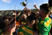 13 September 2020; Dunloy captain Paul Shiels, centre, and his team-mates celebrate with the cup after the Antrim County Senior Hurling Championship Final match between Dunloy Cuchullains and Loughgiel Shamrocks at Páirc Mhic Uilín in Ballycastle, Antrim. Photo by Brendan Moran/Sportsfile